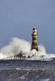 Waves Crashing Against Roker Lighthouse Wall Mural