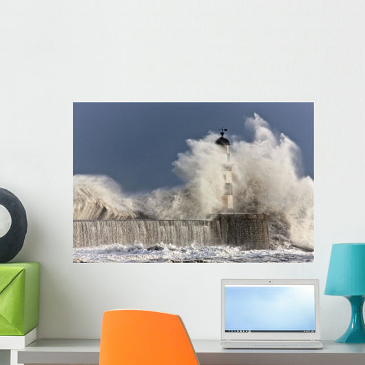 Waves Crashing Up Against A Lighthouse Wall Mural