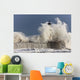 Waves Crashing Up Against A Lighthouse Wall Mural