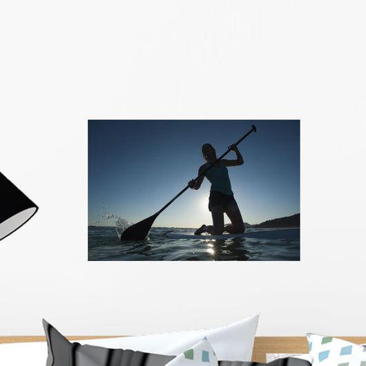 A Woman Paddling While Wall Mural