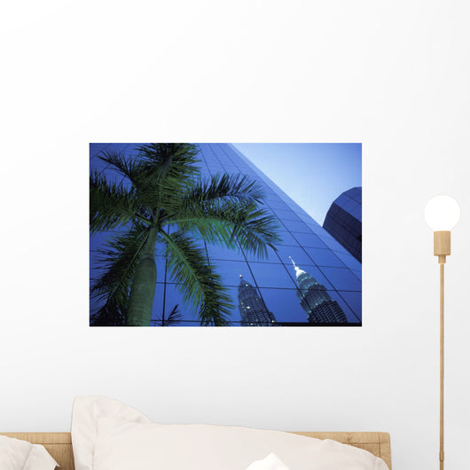 Palm Tree And Reflection Of Petronas Towers In Facade Wall Mural