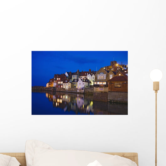 UK, Yorkshire, Houses reflecting in water at dusk Wall Mural