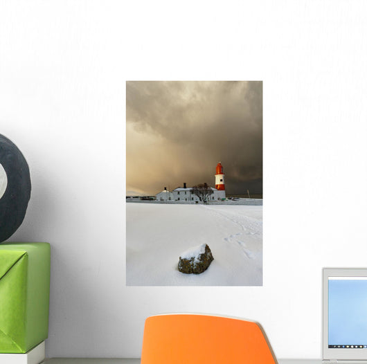 A Lighthouse And Building In Winter Wall Mural