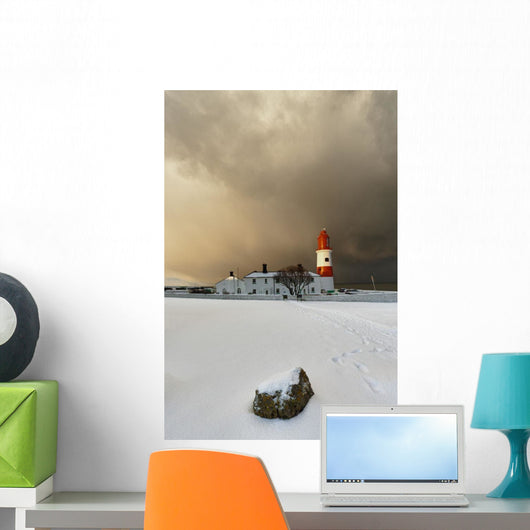 A Lighthouse And Building In Winter Wall Mural