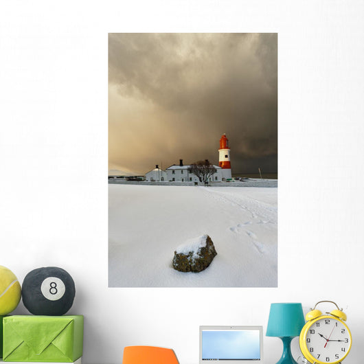A Lighthouse And Building In Winter Wall Mural