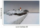 A Snow Covered Fence With A Lighthouse And Building In The Background Wall Mural