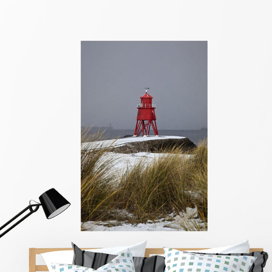 A Red Lighthouse Along The Coast Wall Mural