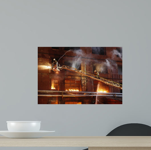 Firefighters fighting a fire Wall Mural