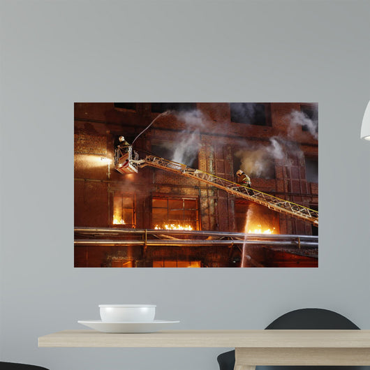 Firefighters fighting a fire Wall Mural