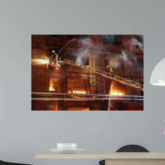Firefighters fighting a fire Wall Mural