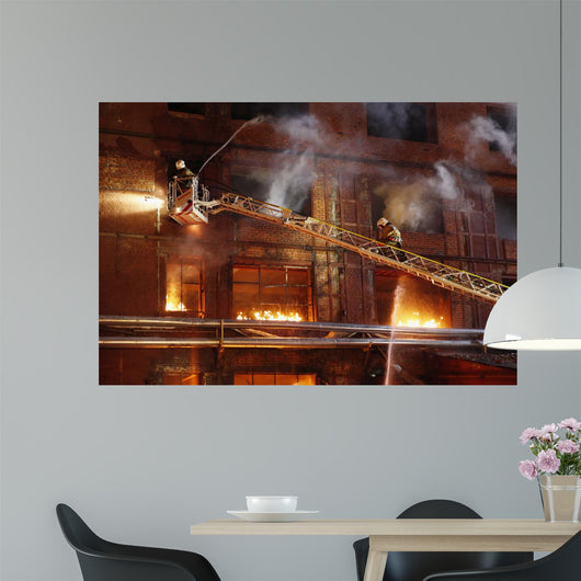 Firefighters fighting a fire Wall Mural