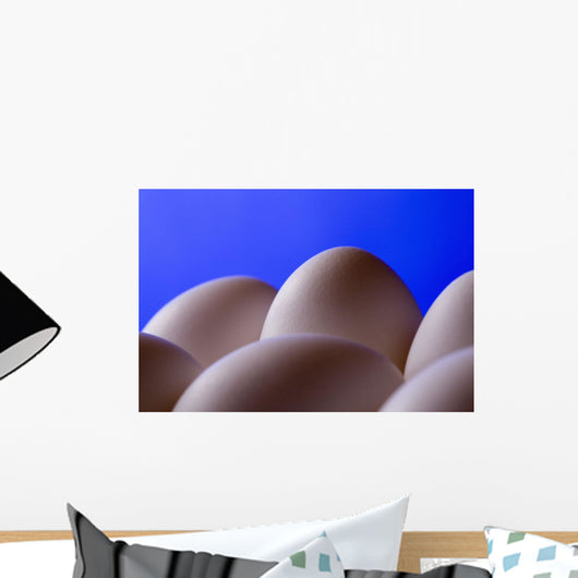 Close-Up Eggs Against Blue Background Wall Mural