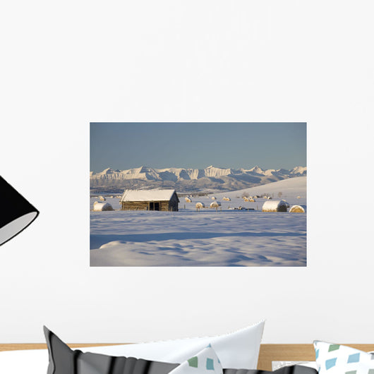 Snow Covered Log Cabin And Hay Bales Wall Mural
