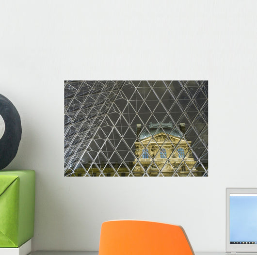 Looking Out Of The Pyramid To The Louvre Museum At Night Wall Mural