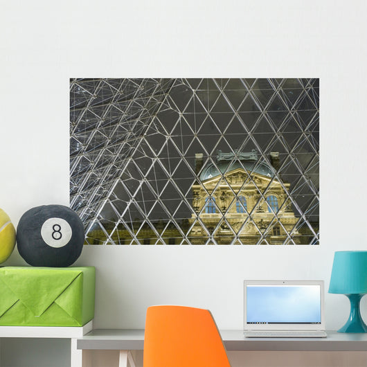 Looking Out Of The Pyramid To The Louvre Museum At Night Wall Mural