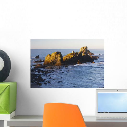 Sun Shining On The Rocks At Sunrise At Ecola State Park Wall Mural