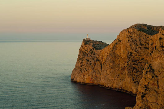 Views Of The Lighthouse At Sunset Wall Mural