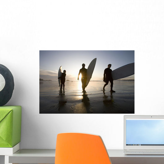 Silhouette Of Three Surfers Carrying Surfboards Wall Mural
