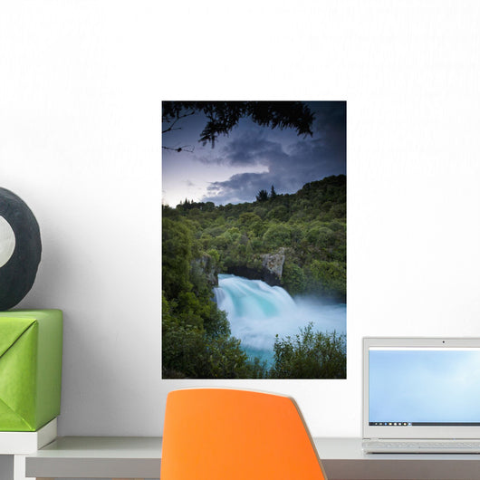 A Waterfall Surrounded By A Forested Area Wall Mural