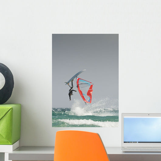 A Windsurfer Flips Upside Down On The Water Off Valdevaqueros Beach Wall Mural