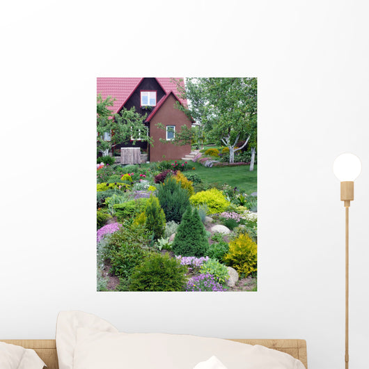 Flowers near the rural house Wall Mural