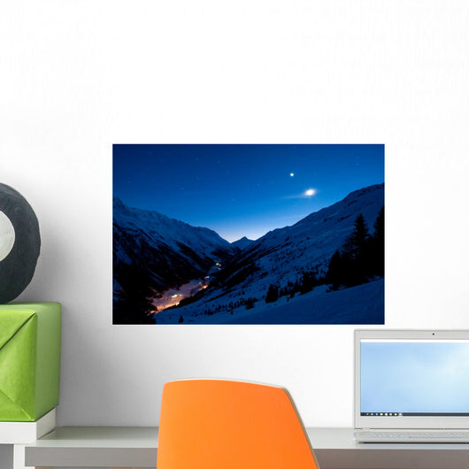 Extreme long exposure of a remote alp valley. Stars in motion. Wall Mural