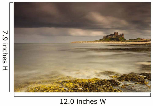 Bamburgh Castle Under A Cloudy Sky Wall Mural