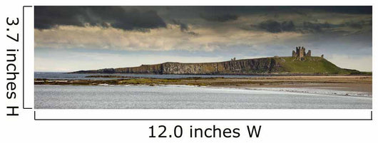 Dunstanburgh Castle On A Hill Under A Cloudy Sky Wall Mural