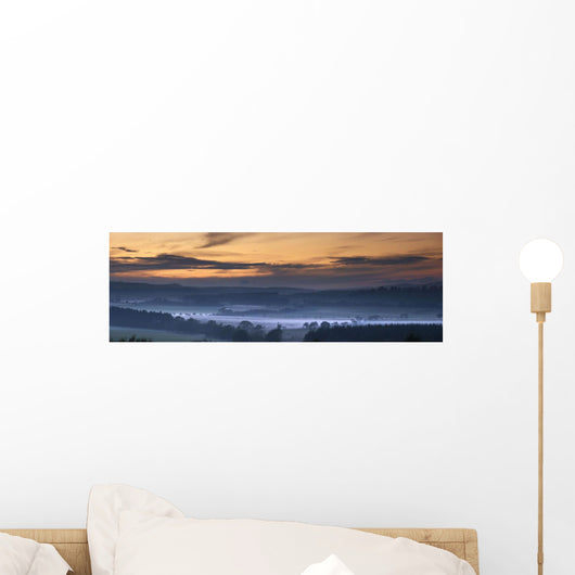 Fog Lies Over A Town At Sunset Wall Mural
