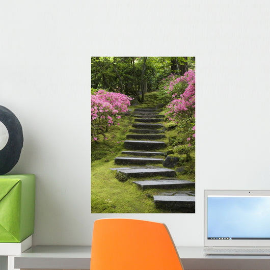 Rock Stairway Along A Moss Covered Hill With Flowering Bushes Wall Mural