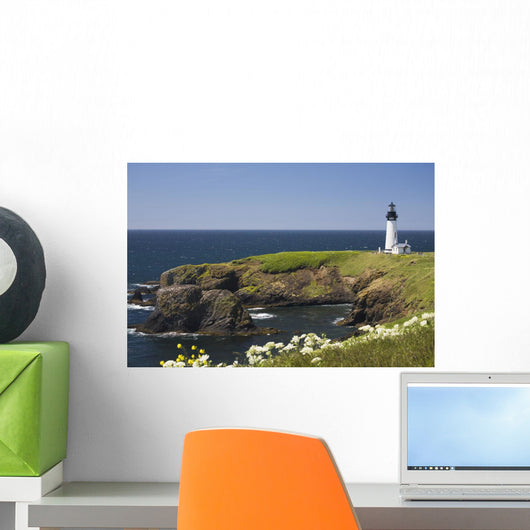 White Lighthouse On The Ocean With Blue Sky And Wildflowers Wall Mural
