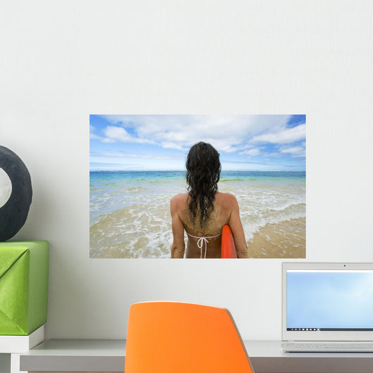 Hawaii, Kauai, Woman Holding Surfboard On Beach, View From Behind Wall Mural