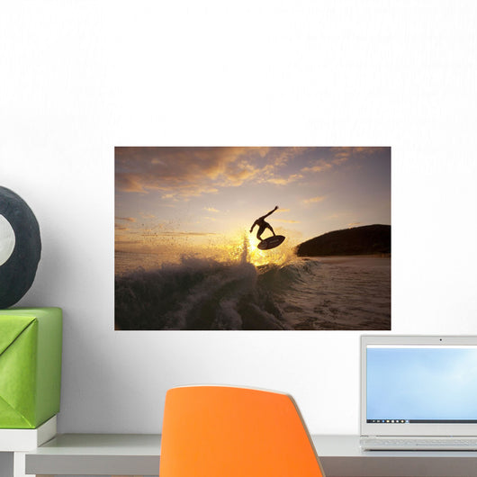 Hawaii, Maui, Makena, Skimboarder Gets Big Air Off A Wave At Sunset Wall Mural