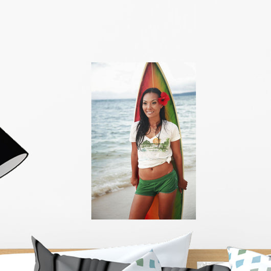 Beautiful Local Girl Smiling And Holding A Colorful Surfboard Wall Mural