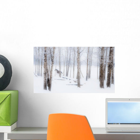 A Horse Stands Beside A Forest Of Bare Trees With The Blustery Snow Wall Mural