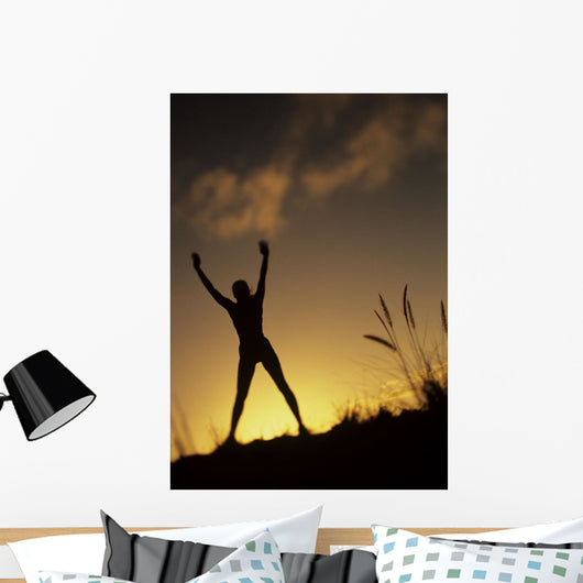 Hawaii, Silhouette Of A Woman Stretching On A Mountain Top At Sunset Wall Mural