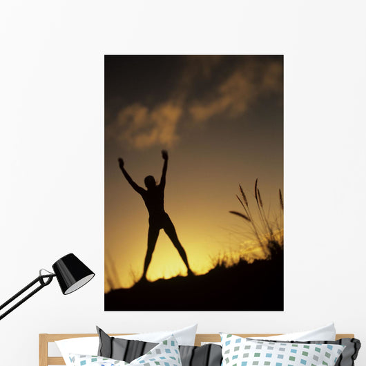 Hawaii, Silhouette Of A Woman Stretching On A Mountain Top At Sunset Wall Mural