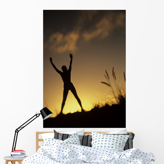 Hawaii, Silhouette Of A Woman Stretching On A Mountain Top At Sunset Wall Mural
