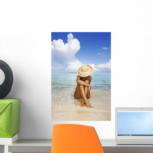 Hawaii, Woman Sitting In The Ocean At A Remote Tropical Location Wall Mural