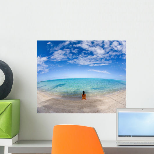 Hawaii, Woman Laying On The Beach In Remote Tropical Location Wall Mural