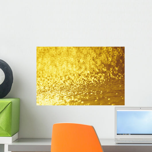 Closeup Of Golden Shimmering Reflections Off Water Wall Mural
