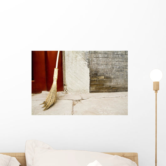 China, Broom Leaning Against Cement Wall Wall Mural