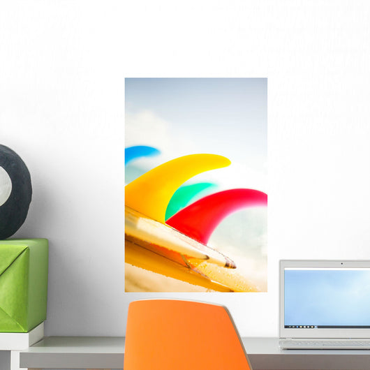 Colorful Surfboards Fins, Bright Sunny Sky In Background Wall Mural