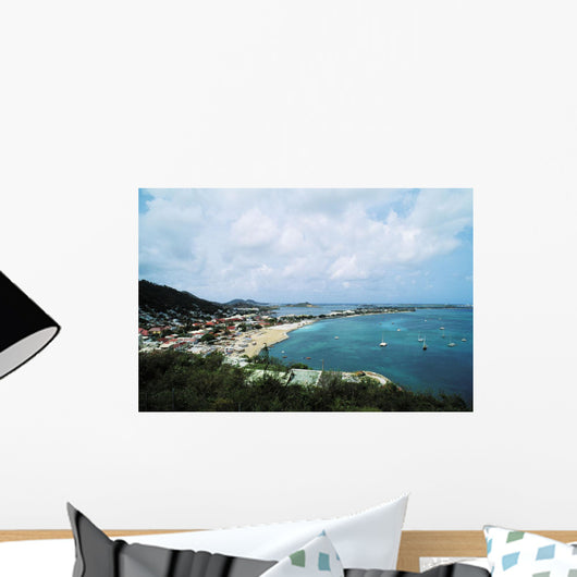 Saint Martin, view of coastal town and harbor Wall Mural