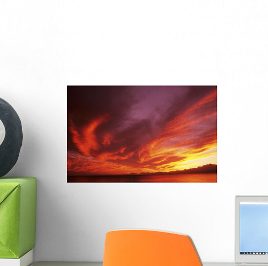 Sunset Over Seascape, Brightly Colored Clouds Illuminated Over Ocean Wall Mural