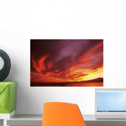 Sunset Over Seascape, Brightly Colored Clouds Illuminated Over Ocean Wall Mural
