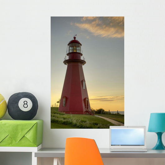 Red Lighthouse At Sunset Wall Mural