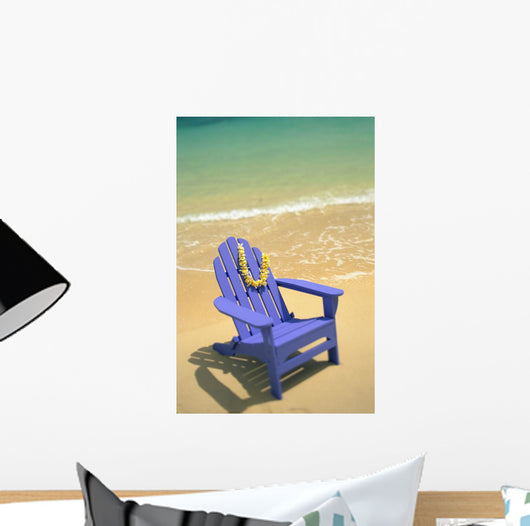 Blue Chair Along Shoreline With Plumeria Lei Hanging On Side Wall Mural