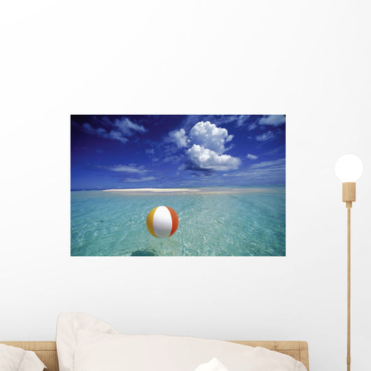Calm Ocean With Beach Ball Foreground Wall Mural