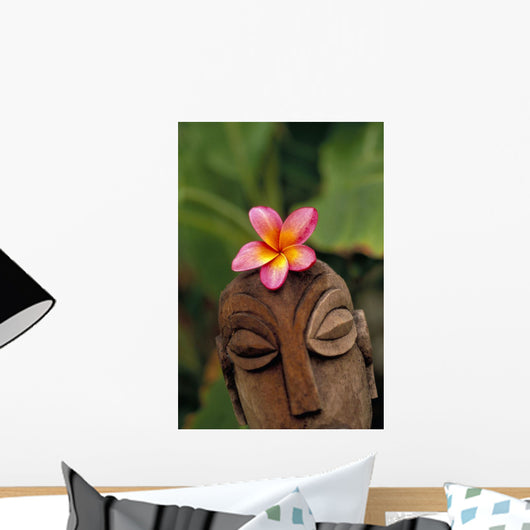 Pink Plumeria Flower Atop Wooden Polynesian Statue Carving, Outdoor Wall Mural
